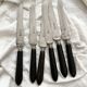 6 antique black wooden table knives La Trompette, late 19th century