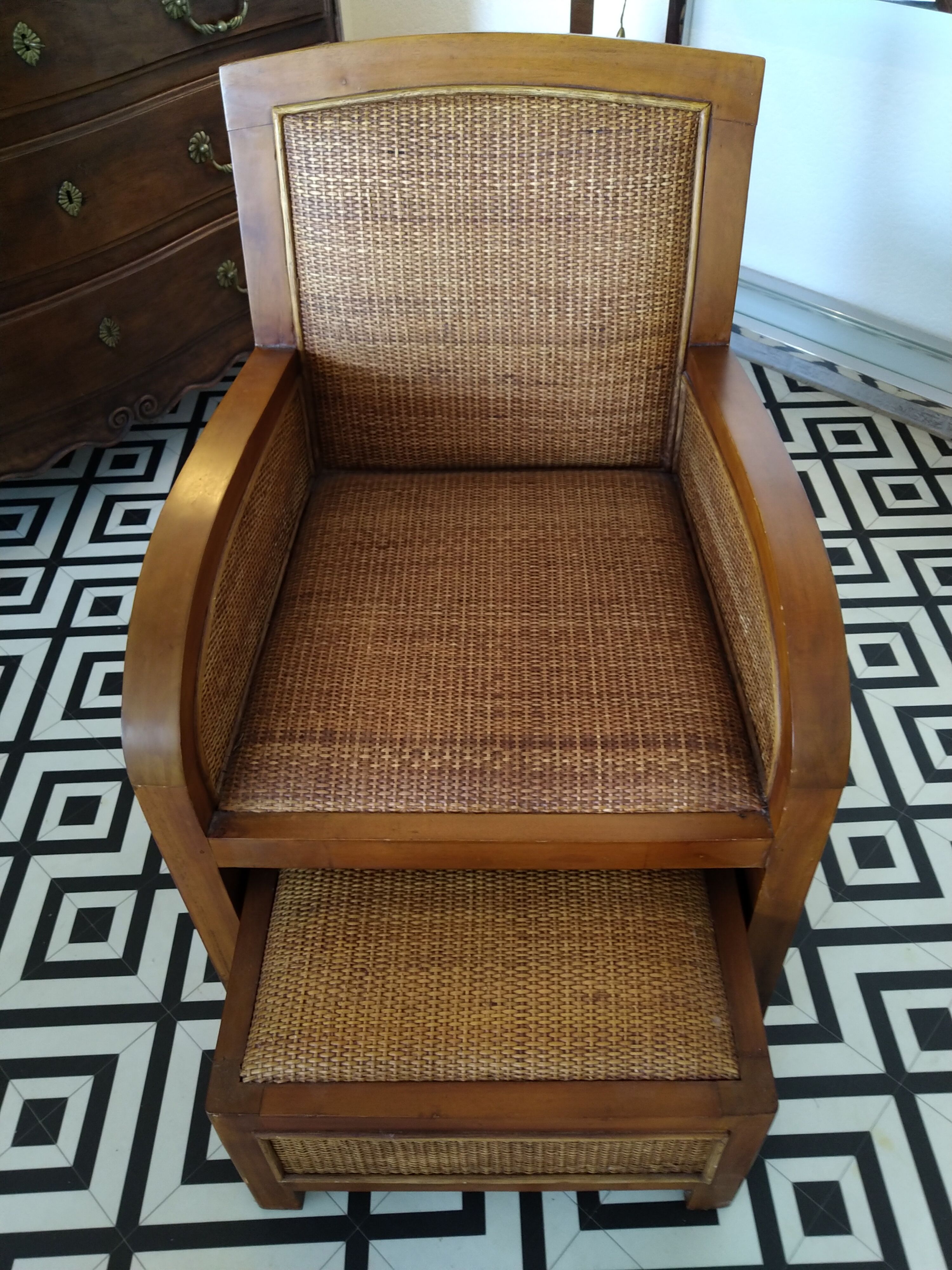 Colonial rattan armchair with ottoman