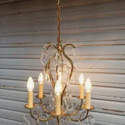 Remarkable cage chandelier with 6 lights and complete crystal pendants in working condition.