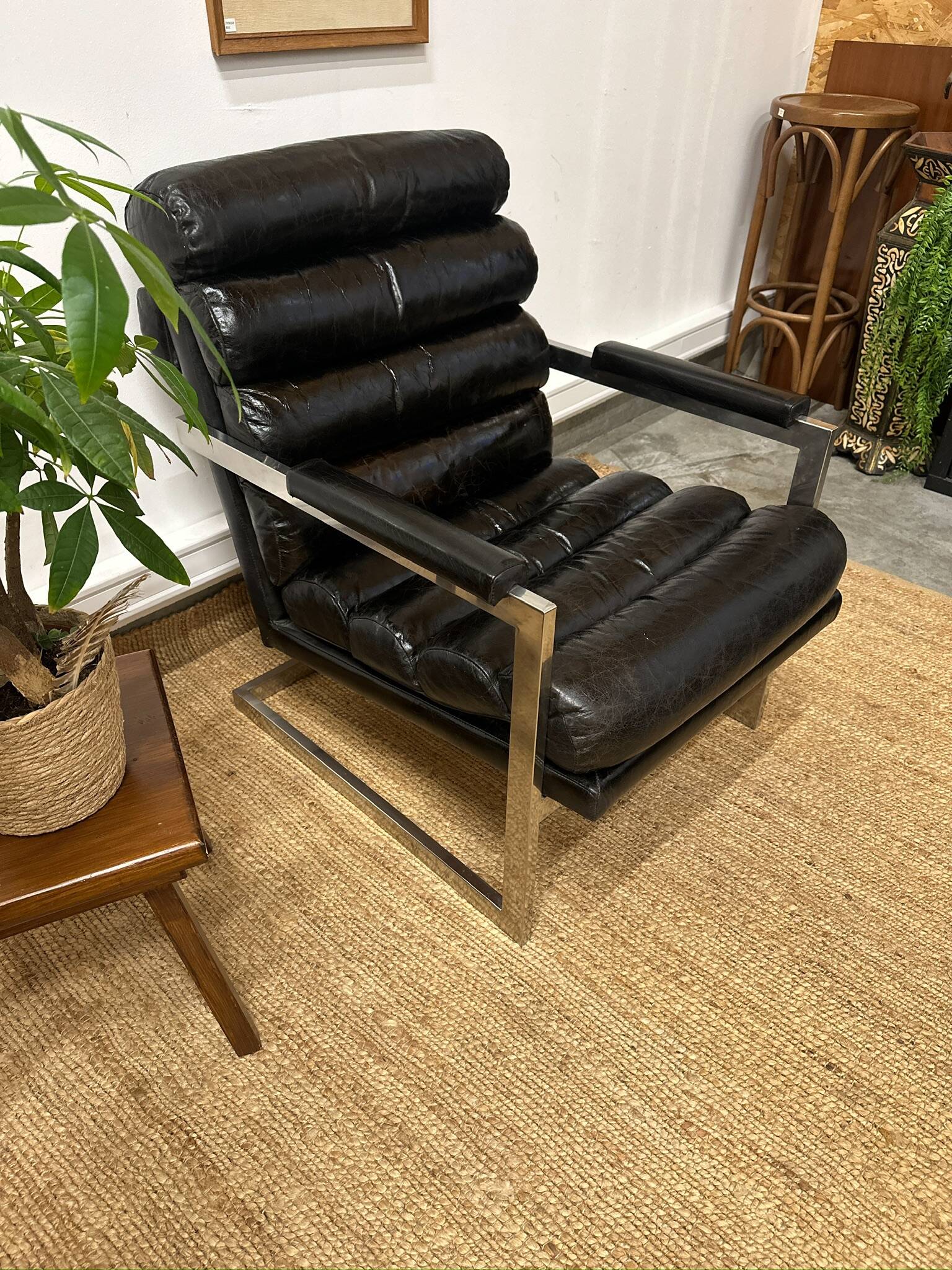 Vintage 1970s black leather armchair – metal frame