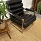 Vintage 1970s black leather armchair – metal frame