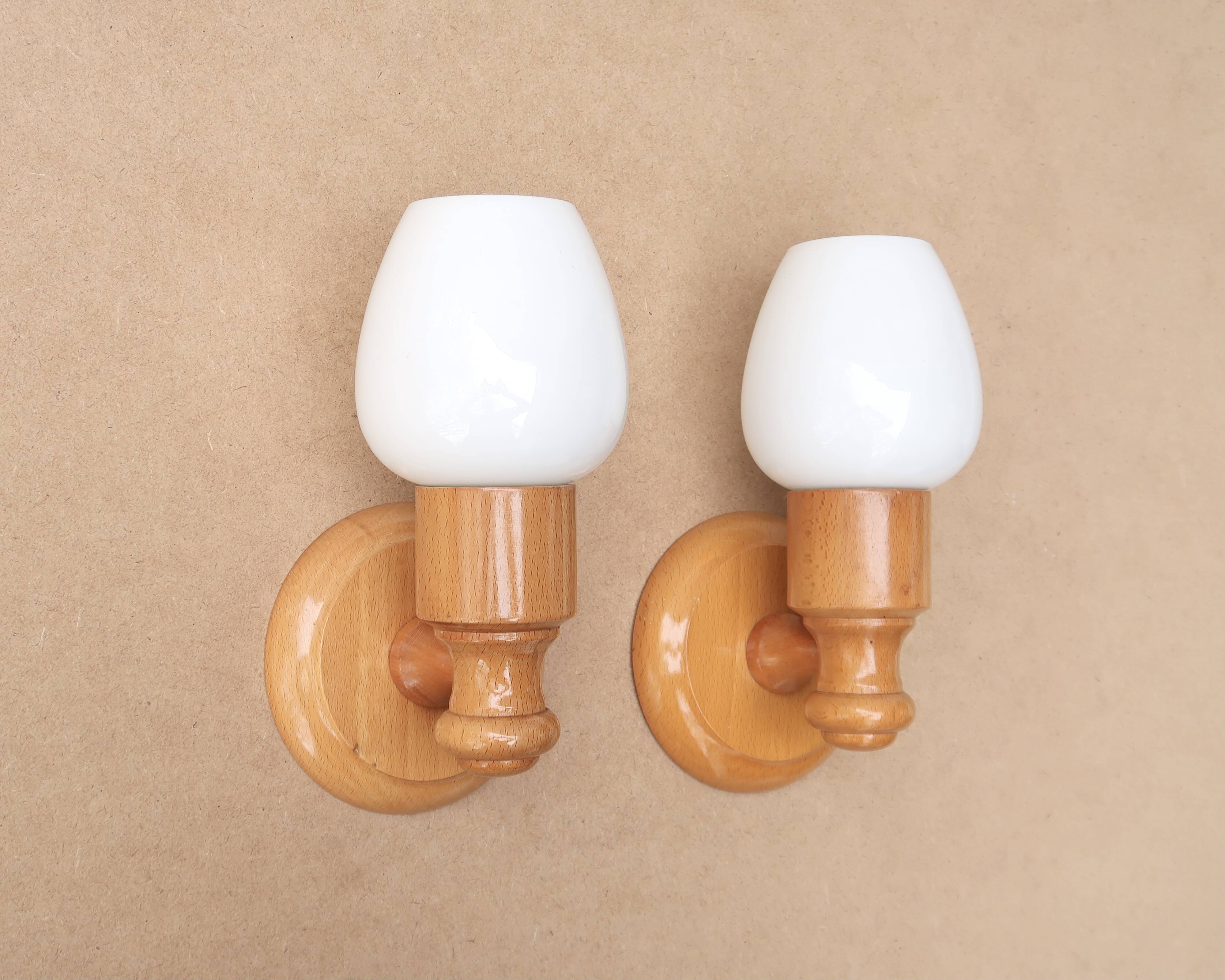 Pair of pine wood and white glass wall lights, 1970s