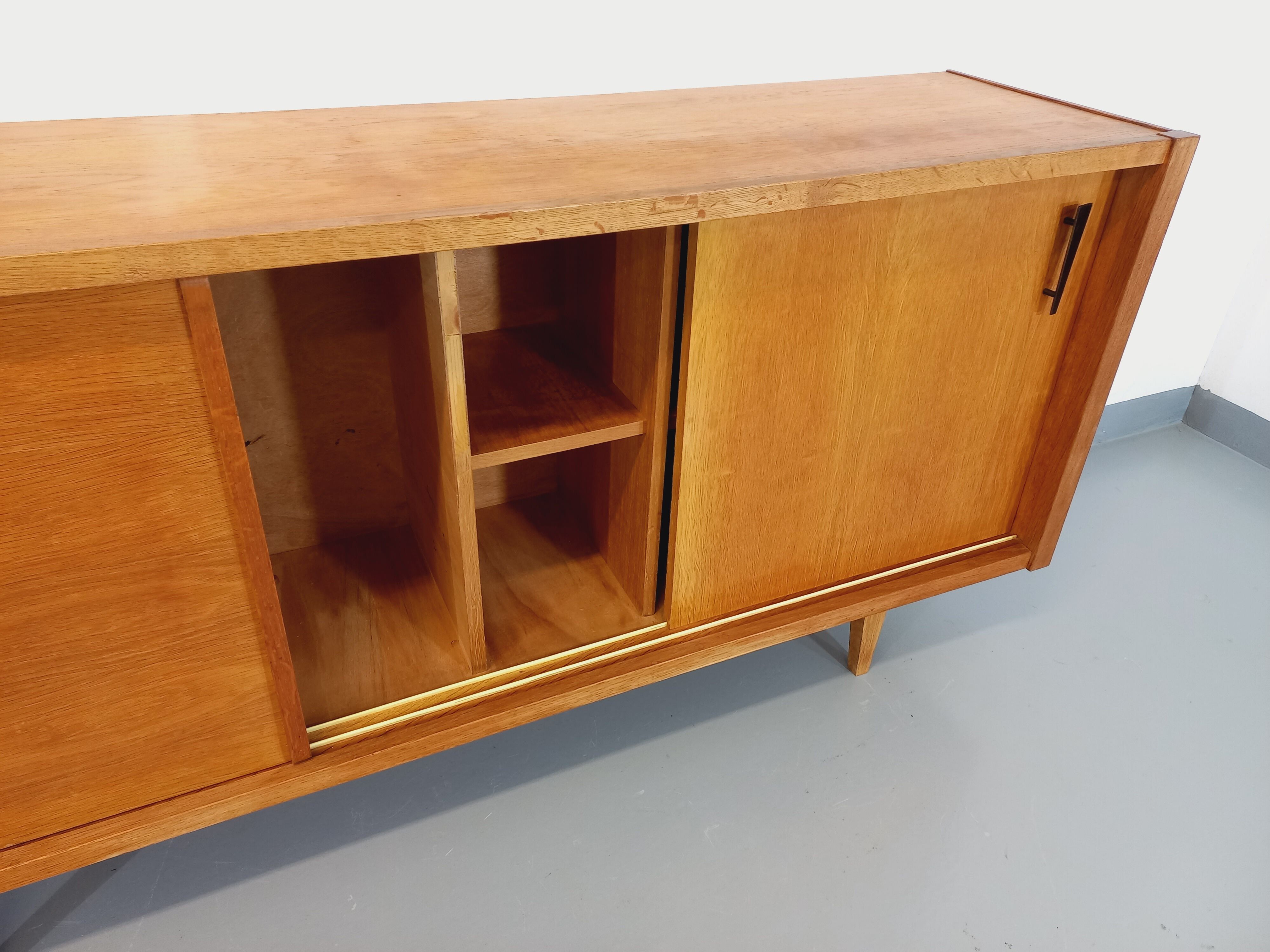 Vintage row in light oak wood from the 60s