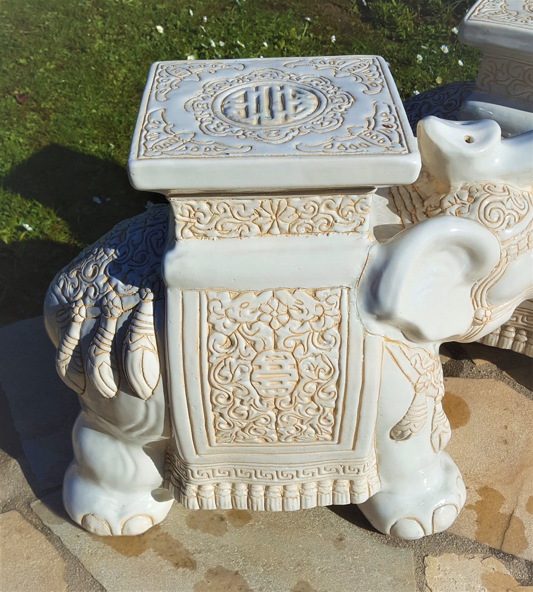 Pair of enamelled white ceramic elephant harnesses