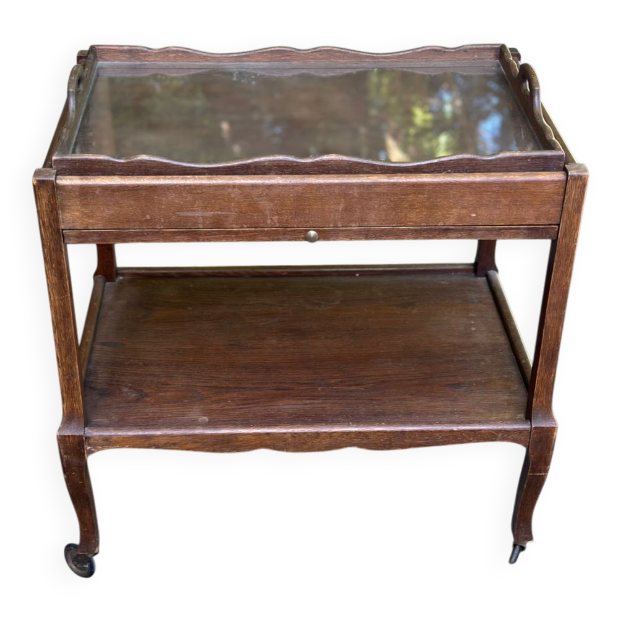 Extendable wooden bar trolley with a glass top from the 1930s.