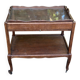Extendable wooden bar trolley with a glass top from the 1930s.
