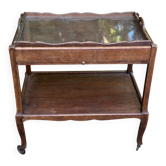 Extendable wooden bar trolley with a glass top from the 1930s.