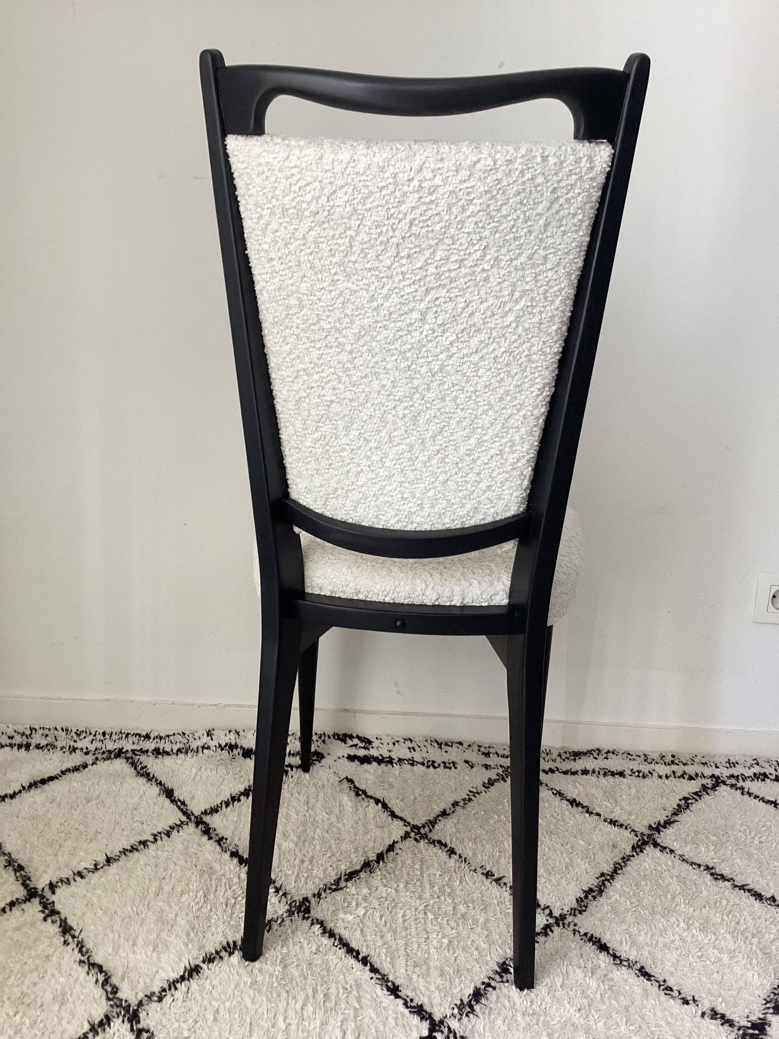 Fully restored vintage chair in boucle fabric.