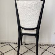 Fully restored vintage chair in boucle fabric.