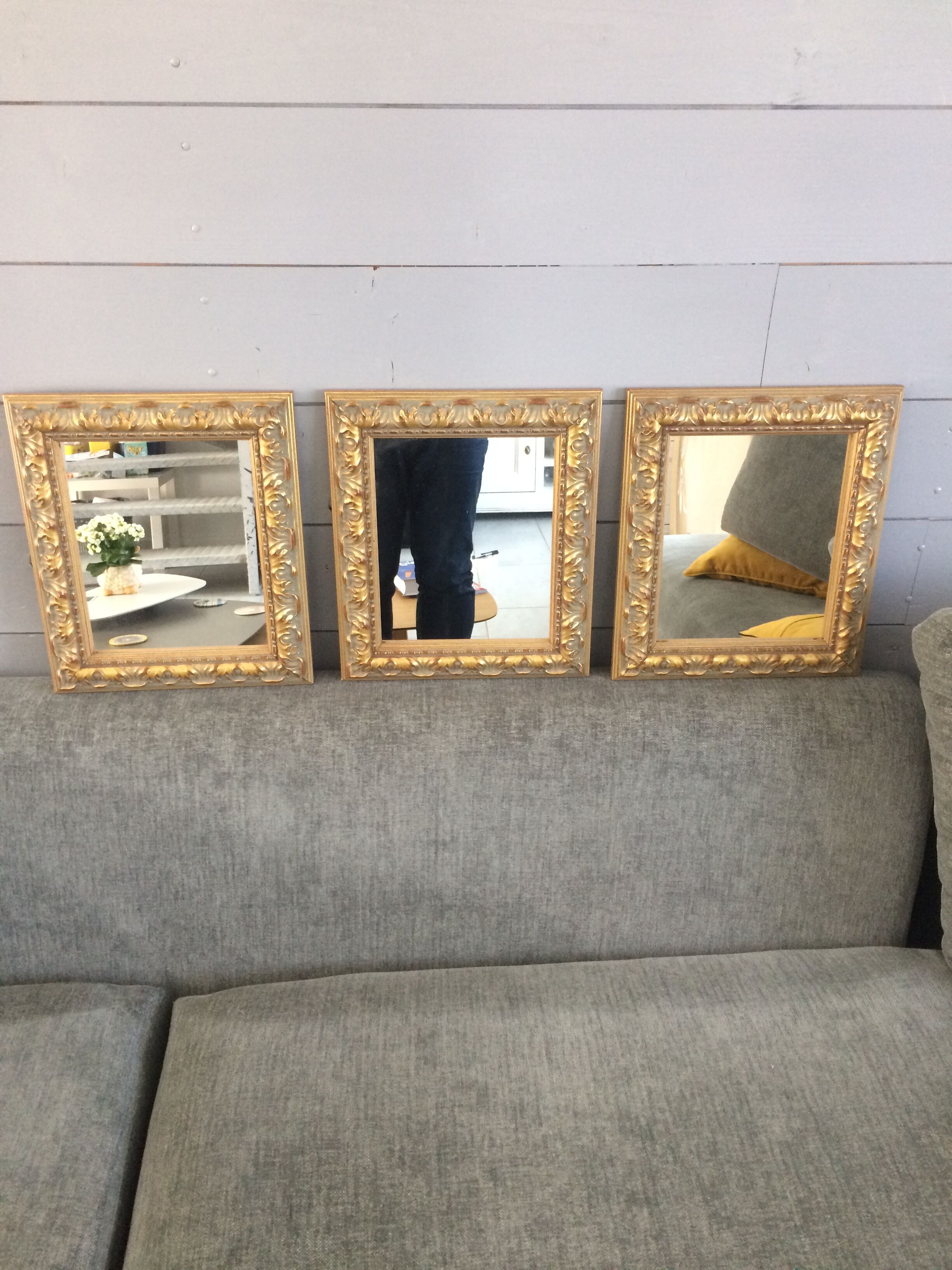 Triptych of ancient gilded mirrors