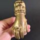 Antique gilt bronze door knocker – Stylized hand
