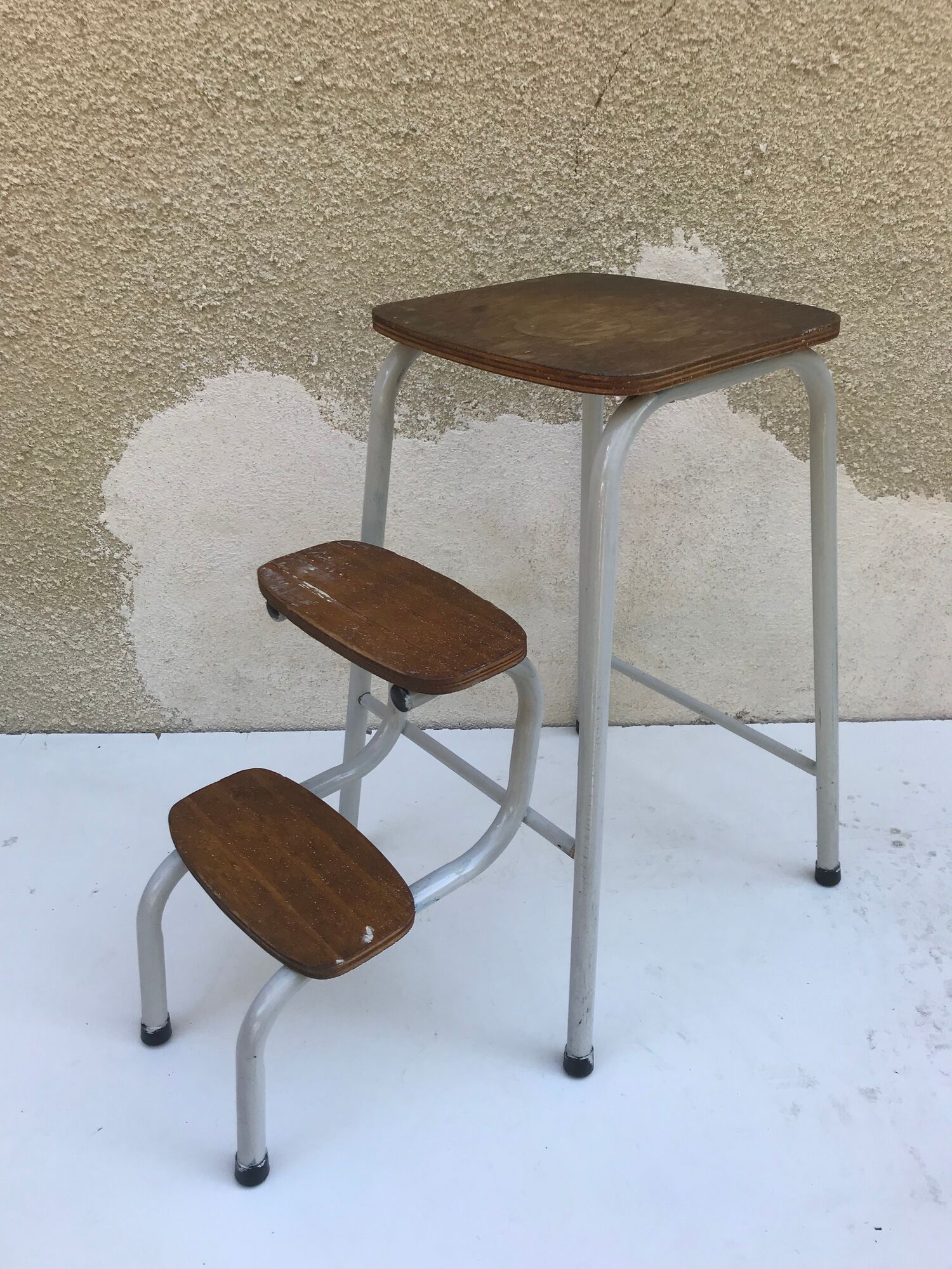 Antique grey metal step ladder