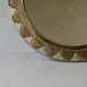 Large round Moroccan mirror in chiseled brass and copper, 1970s-1980s