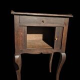 Curtained bedside table