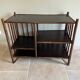 Brown rattan console shelf