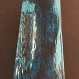 Ashtray paved in blue glass