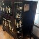 "Chinese black lacquer cabinet, mother-of-pearl inlays, court scenes"