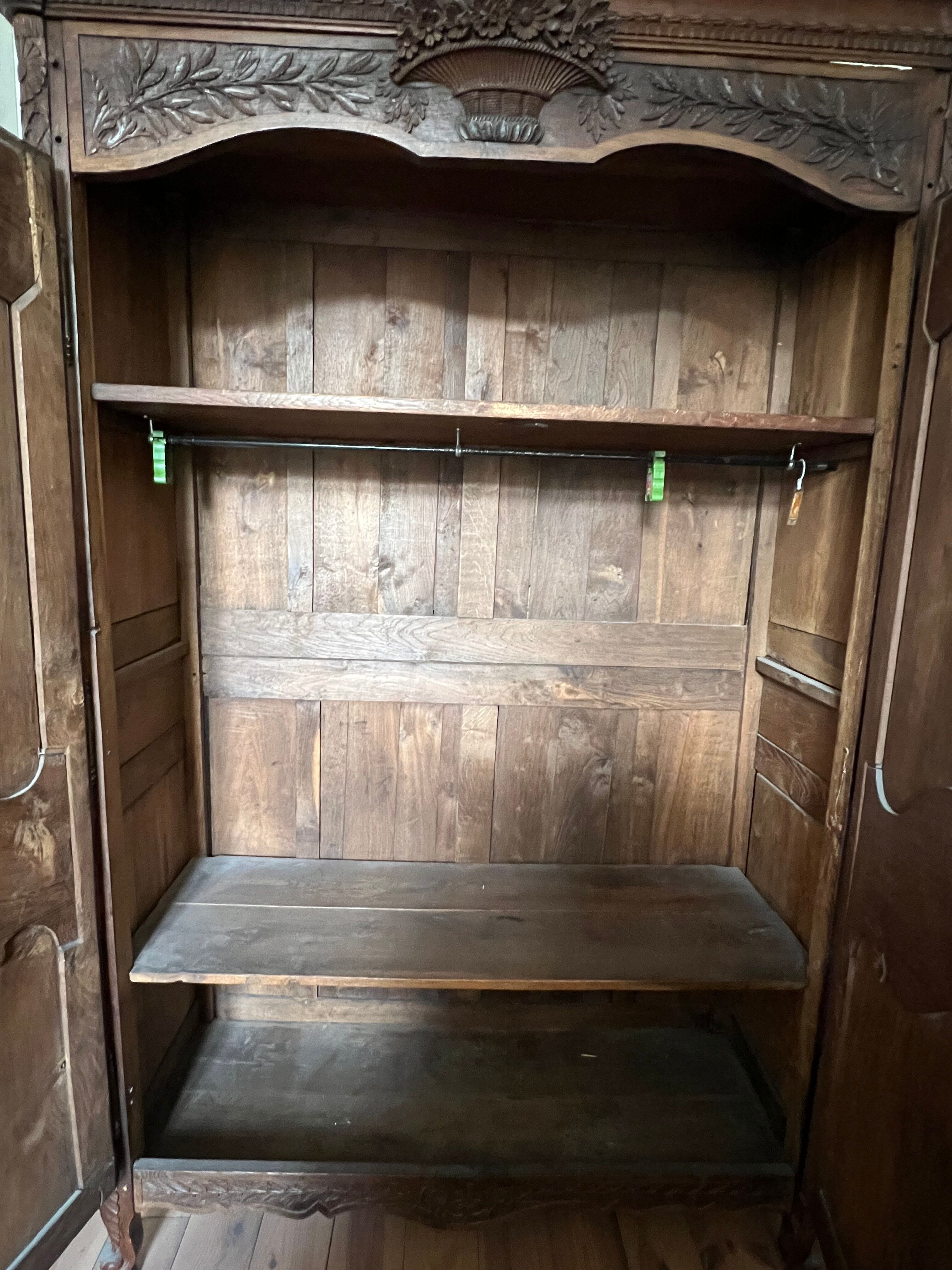 Beautiful and ancient Norman wedding wardrobe, richly carved