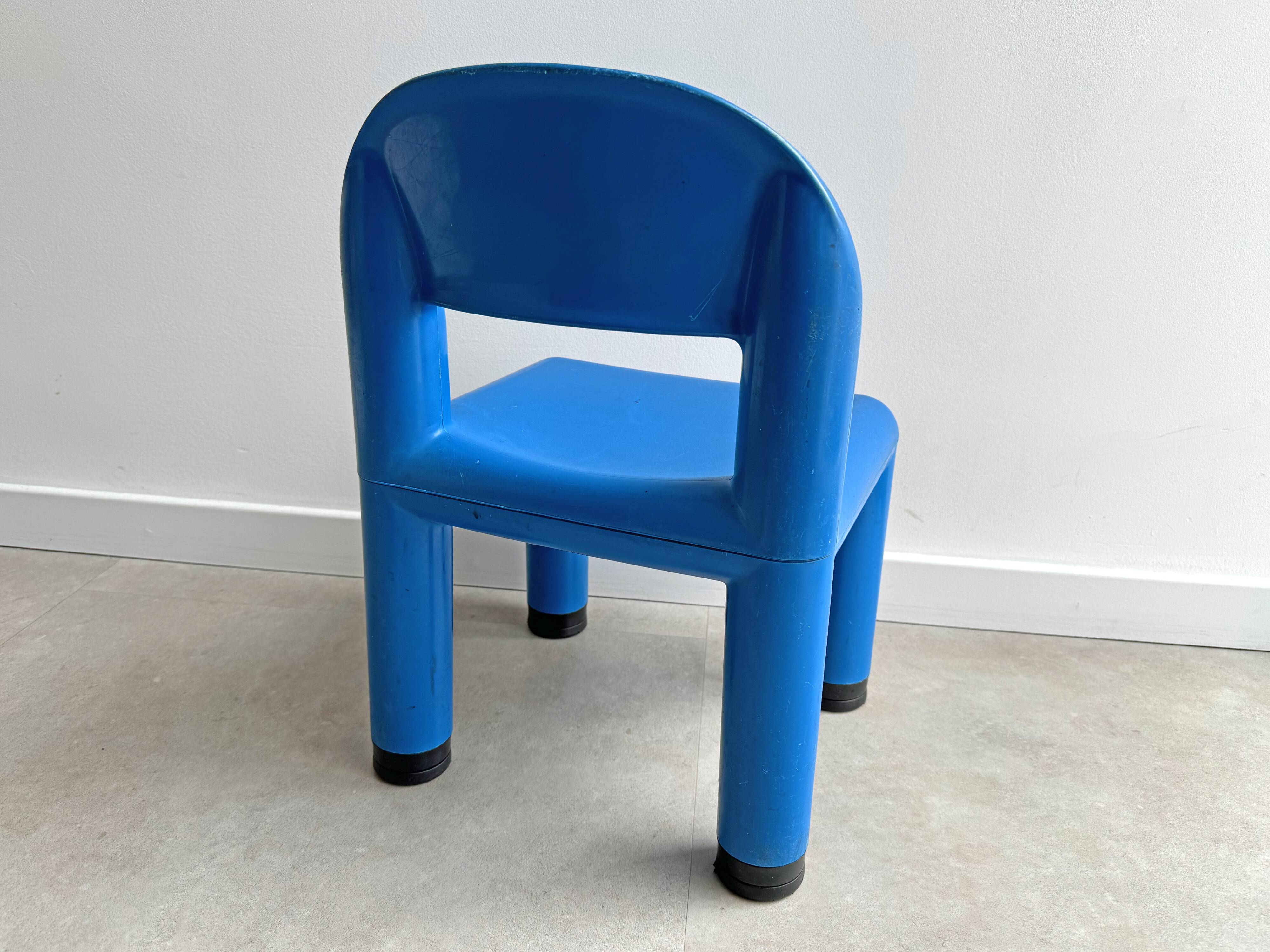 Blue plastic space age kids chair, bold italian design