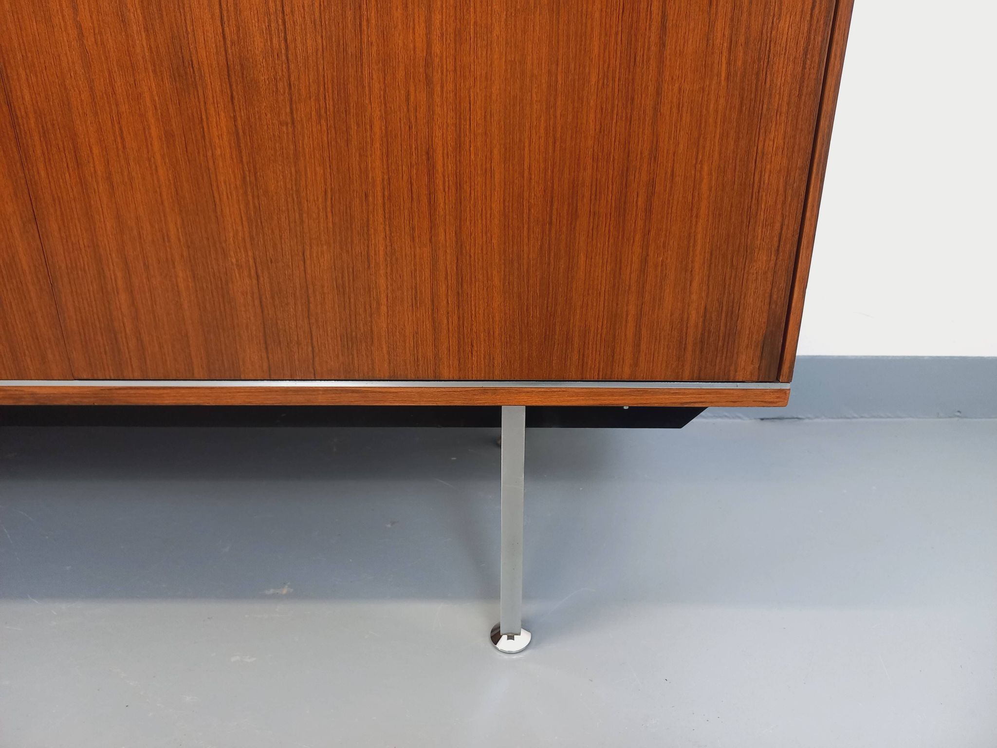 Vintage modernist enfilade in rosewood and chrome metal from the 60s and 70s.