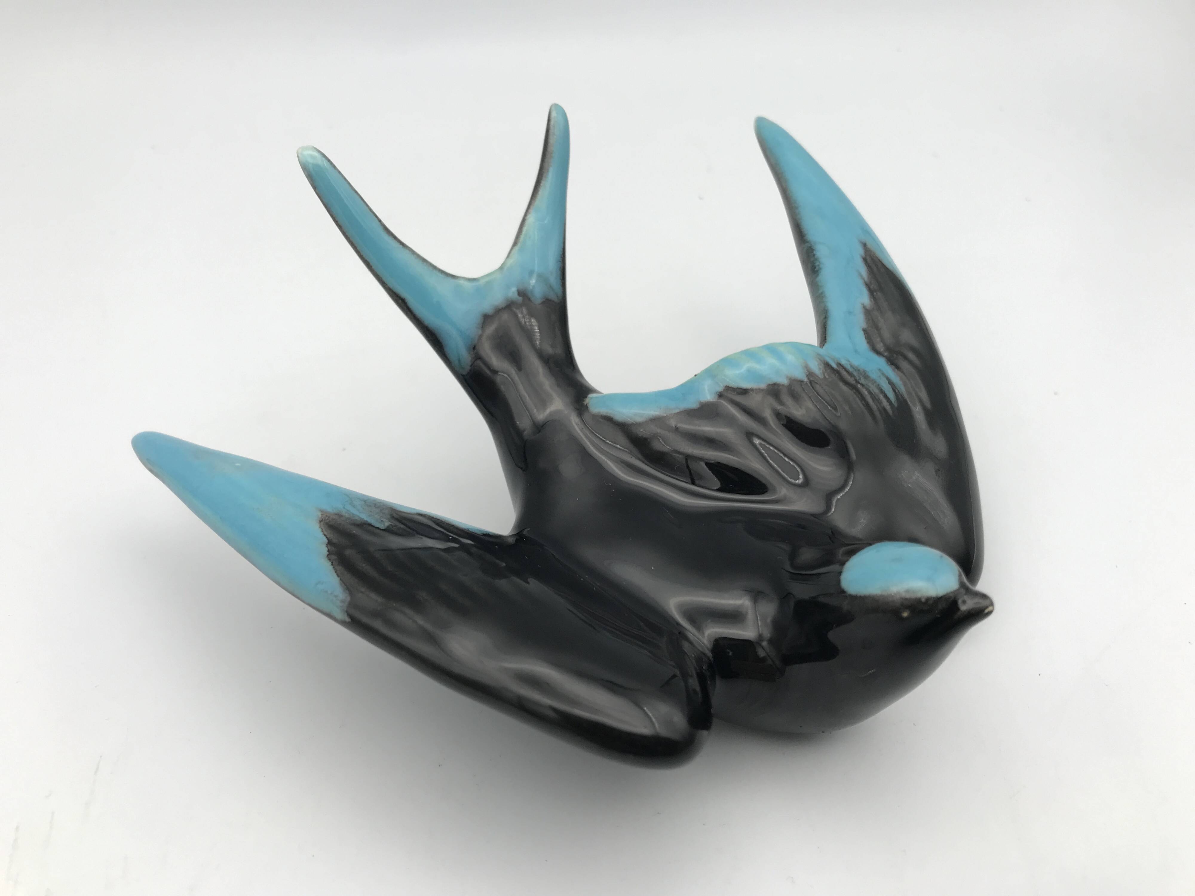 Vintage swallow in two-tone black and blue enameled ceramic