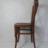 Old curved wooden bistro chair