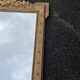 Large gold mirror in Louis XVI style with laurel crown, 121 cm.
