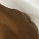 School bust of a female body in red clay terracotta