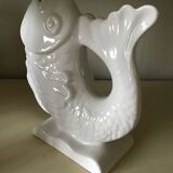 White ceramic vase in the shape of fish