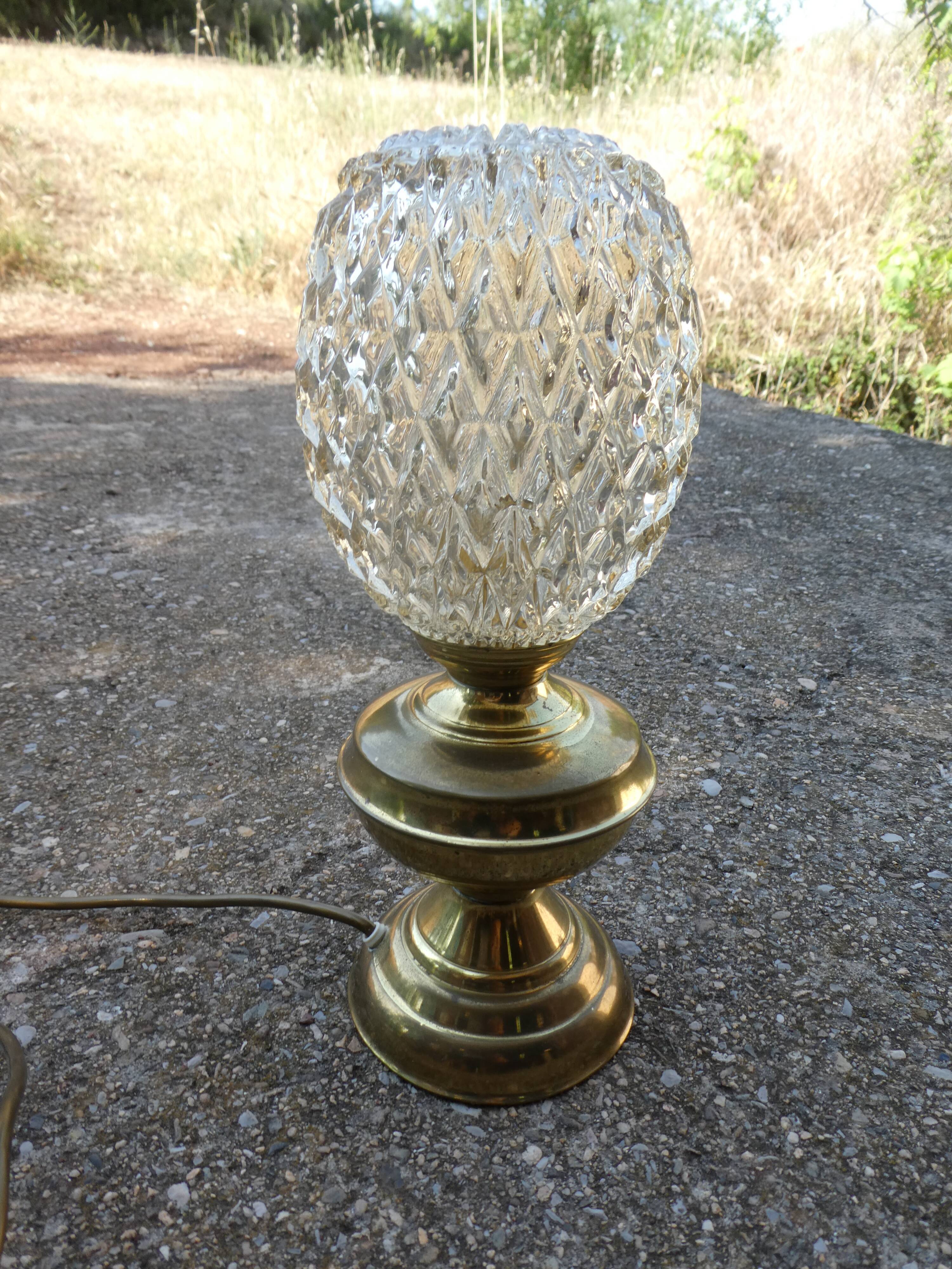 Vintage table lamp with chiseled glass globe.
