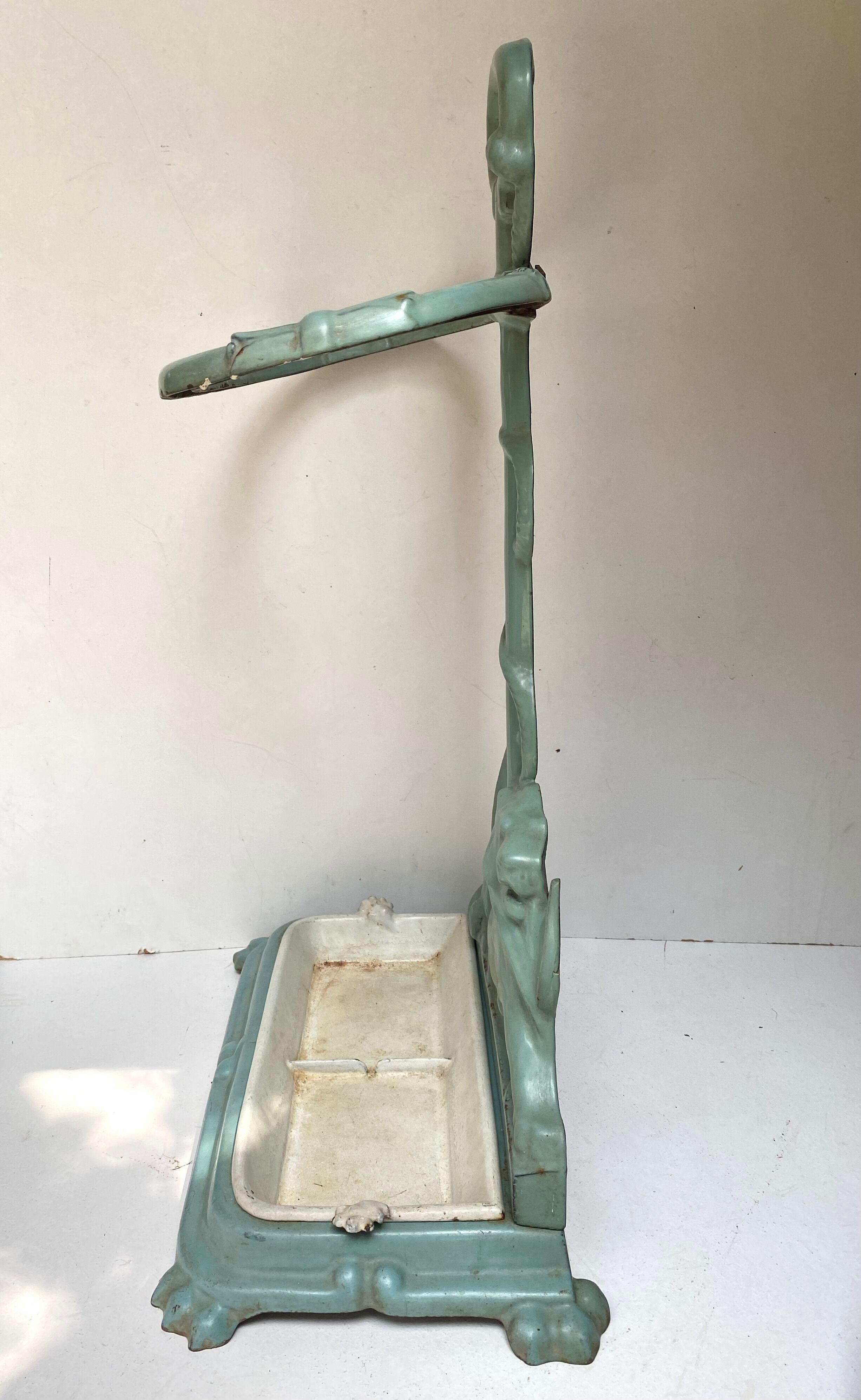 Enameled cast iron umbrella stand from the early 20th century