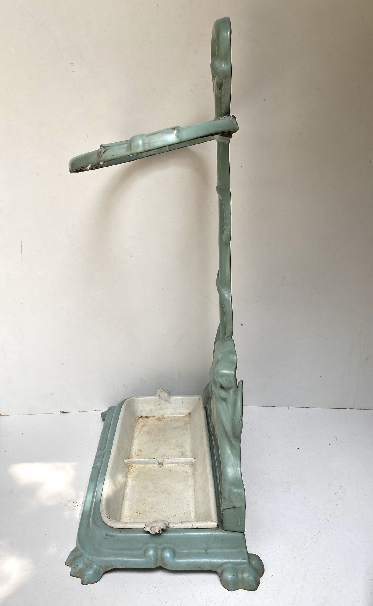 Enameled cast iron umbrella stand from the early 20th century