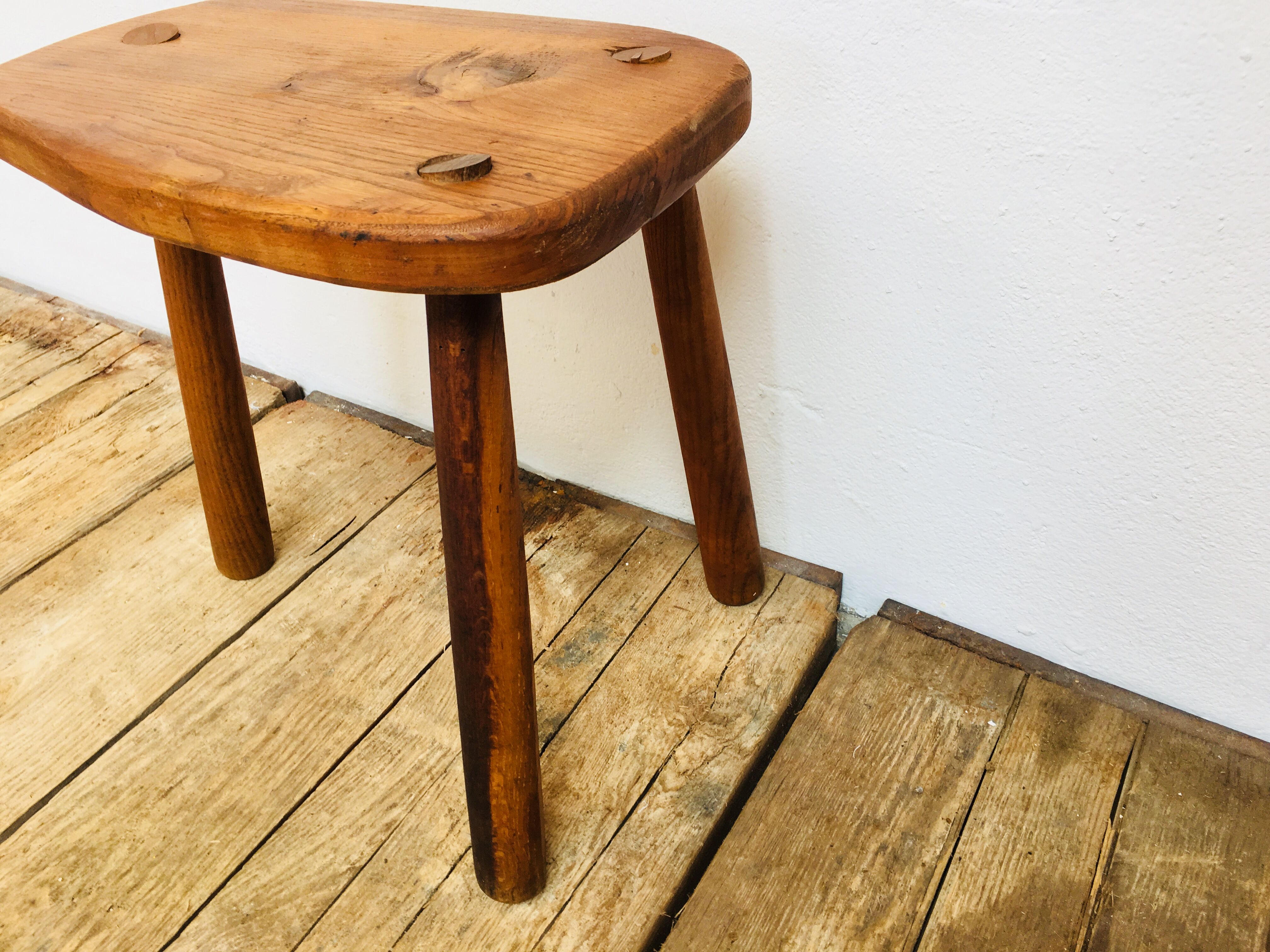 Wooden tripod stool