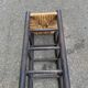 High bar stool in dark solid wood and straw 75cm