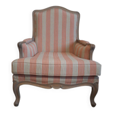 Louis XV bergère style, cerused, reupholstered in coral striped linen – Very good condition.