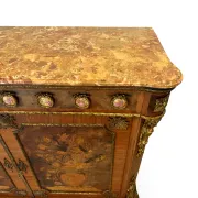 An antique French Louis XVI-style marble-top side cabinet
