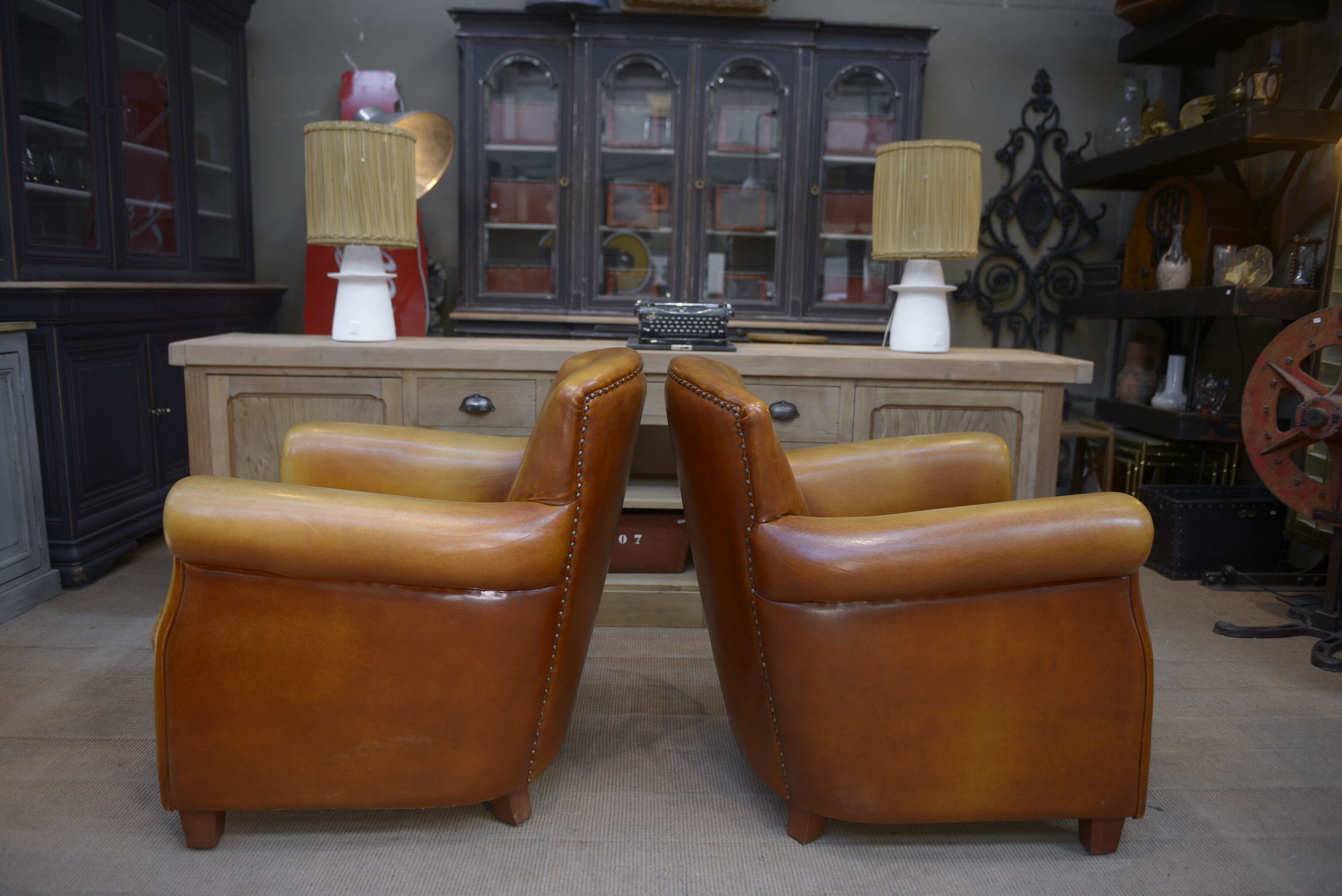 Paire de fauteuils club vintage en cuir