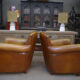 Paire de fauteuils club vintage en cuir