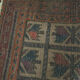 Persian carpet, hand-knotted, geometric design.