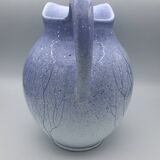 Blue glazed terracotta pitcher with hand-painted decoration, signed
