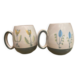 Set of two ceramic mugs signed Yvon ROY