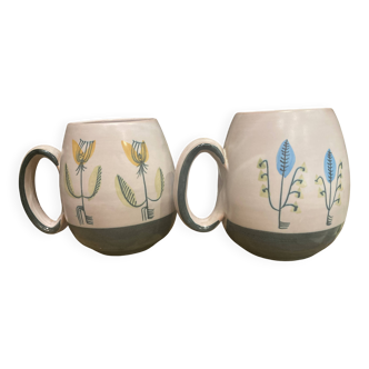 Set of two ceramic mugs signed Yvon ROY