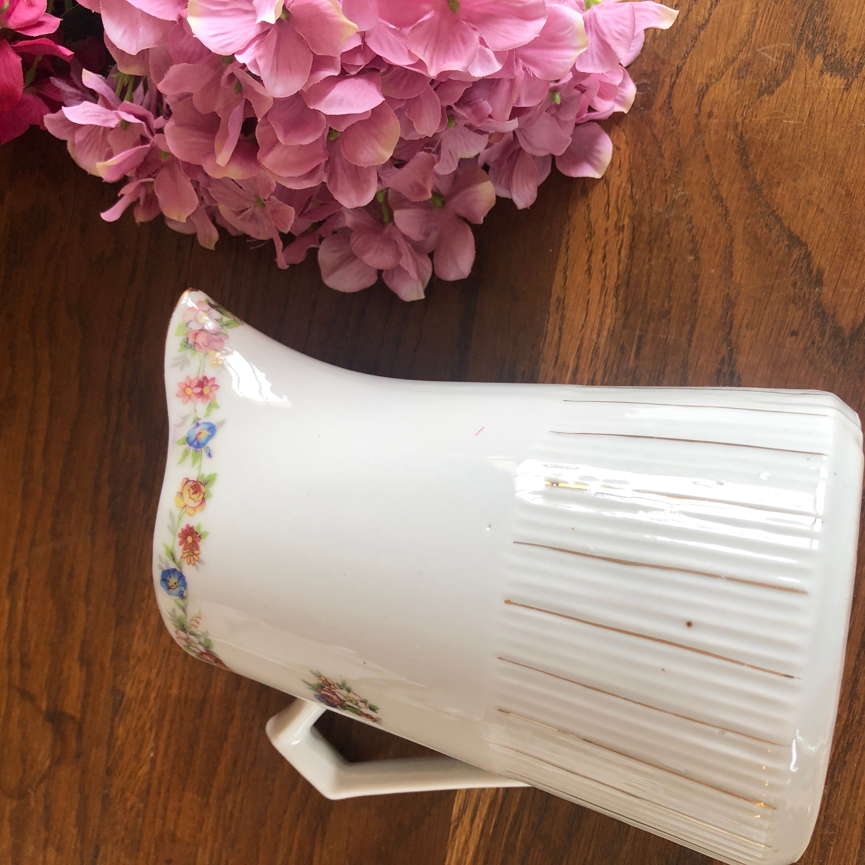 Porcelain pitcher with flowers