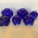 Six stackable cobalt blue candlesticks