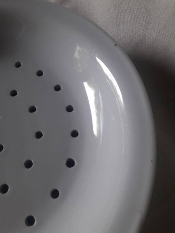 White porcelain drainer and dish