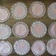11 pink hand-lace coasters