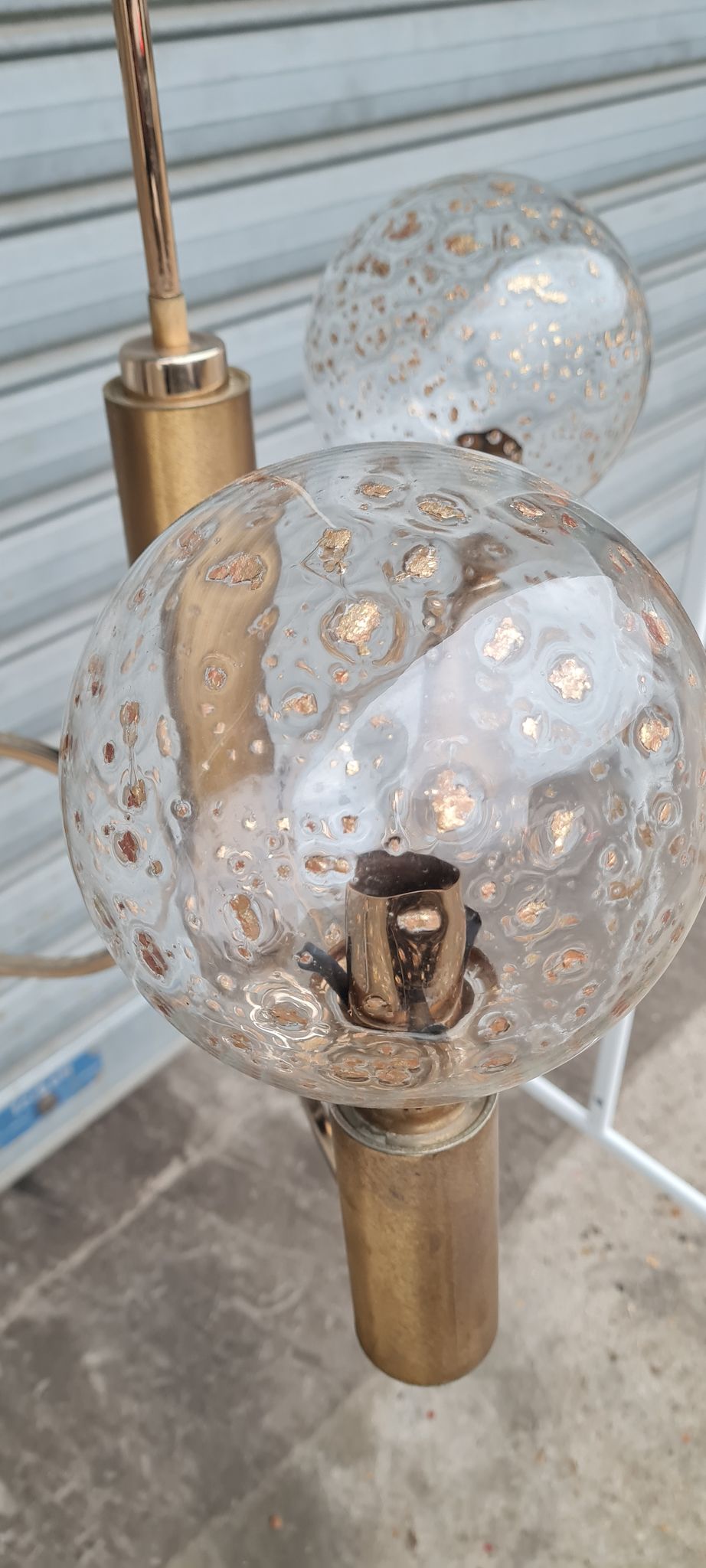 Brass and blown glass chandelier inlaid with gold