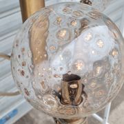 Brass and blown glass chandelier inlaid with gold