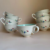 Set of 9 floral Luneville porcelain coffee cups with gold edges
