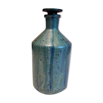 Apothecary bottle in polished glass glazed green tones